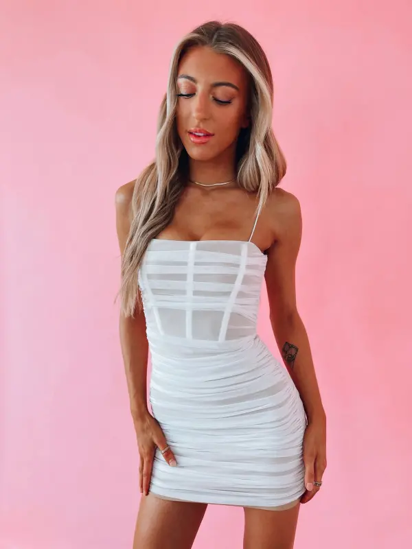 RESTOCKED: Kassadee Fitted Ruched Mini Dress